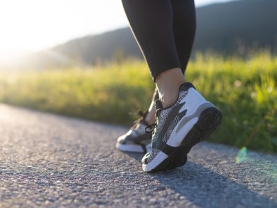 Low Section Of Woman Walking On Road In Mountains Photo taken in Salzburg, Austria